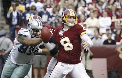 Jennifer Milbrett/The Washington Examiner
Quarterback Rex Grossman threw for 289 yards, two touchdowns and one interception in the Redskins'overtime loss to the Cowboys on Sunday.