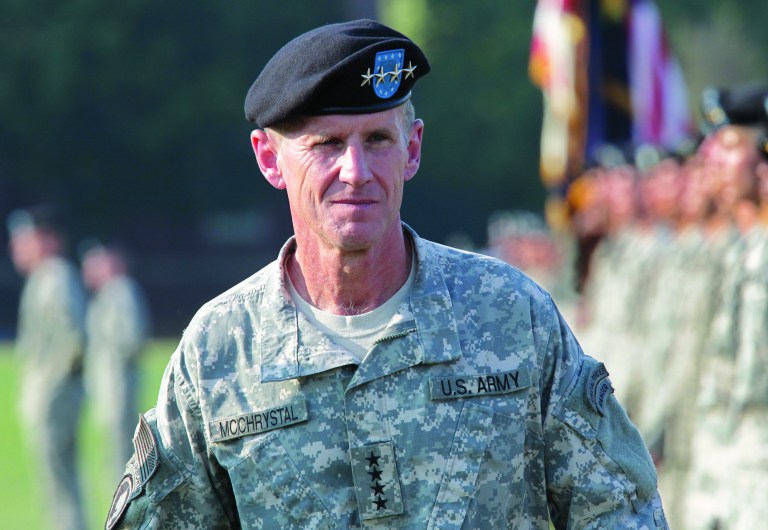 FILE - This July 23, 2010, file photo shows Gen. Stanley McChrystal reviewing troops for the last time as he is honored at a retirement ceremony at Fort McNair in Washington. Speaking out for the first time since he resigned, retired Gen. Stanley McChrystal writes in a new memoir that he takes the blame for the Rolling Stone article that ended his Afghan command and army career, including for the unflattering comments attributed to his staff about the Obama administration. (AP Photo/J. Scott Applewhite, file)