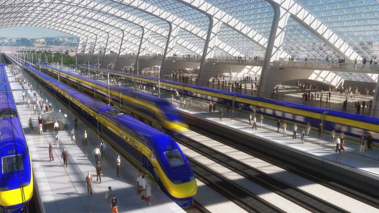 FILE - This image provided by the California High Speed Rail Authority shows an artist's rendering of a high-speed train station. In the latest challenge to California's $68 billion high-speed-rail project, Kings County and a group of its residents filed another lawsuit against the bullet train Thursday, June 5, 2014, alleging continued violations of California's Environmental Quality Act and several other state laws. (AP Photo/California High Speed Rail Authority, File)