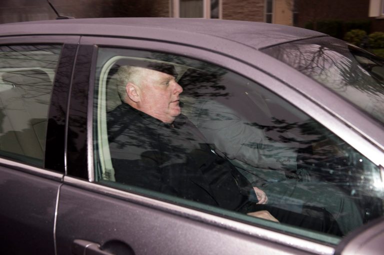 Toronto Mayor Rob Ford leaves his home early Thursday May 1, 2014, in Toronto. Ford will take an immediate leave of absence to seek help for alcohol, he said, as a report surfaced about a second video of the mayor smoking what appears to be crack cocaine. (AP Photo/The Canadian Press, Frank Gunn)
