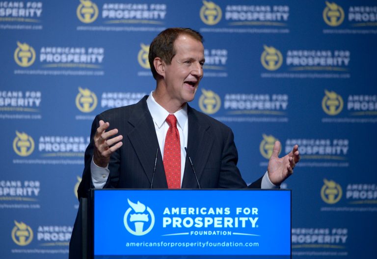 Americans for Prosperity are trying to drive home the message that expanding Medicaid will hurt more than it will help. (AP Photo)