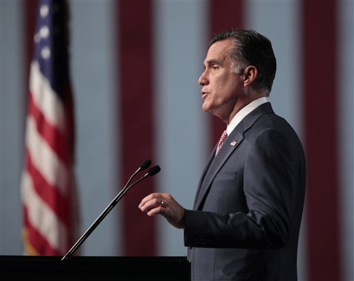 Mitt Romney addresses the 113th National Convention of the Veterans of Foreign Wars in Reno, Nev. Some Republicans are urging him to get more aggressive in jumping to his own defense. (AP photo)