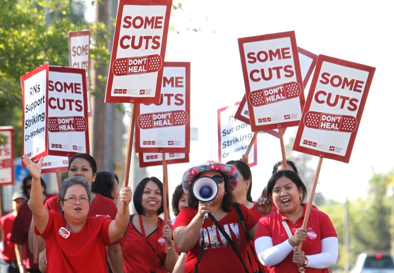 Nurses have every right to communicate with unions, but they shouldn't bus in outsiders to overpower a vocal anti-union group. (AP Photo/Rich Pedroncelli)