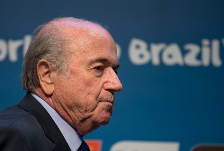 FIFA President Sepp Blatter arrives for a press conference where he talked about the organization and infrastructure of the upcoming World Cup, in Sao Paulo, Brazil, Thursday, June 5, 2014. The World Cup soccer tournament starts on 12 June. (AP Photo/Andre Penner)