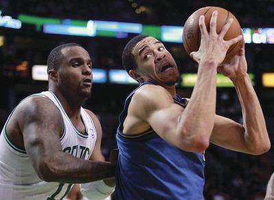 Michael Dwyer/AP
Wizards center JaVale McGee averaged 10.1 points, 8.0 rebounds and 2.4 blocks last season.