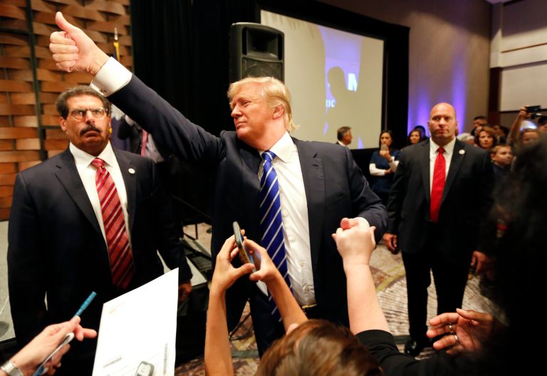Republican presidential candidate, businessman Donald Trump, gives the thumbs up to supporters in North Charleston, S.C. (AP Photo/Mic Smith)