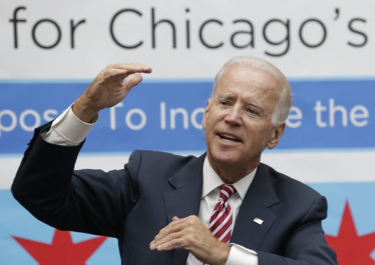 Vice President Joe Biden accompanied by Illinois Gov. Pat Quinn, and Chicago Mayor Rahm Emanuel speaks during a roundtable discussion with small business owners to highlight the importance of raising the minimum wage, Monday, Aug. 25, 2014, in Chicago. Quinn has made raising the minimum wage a cornerstone of his re-election campaign against challenger Republican businessman Bruce Rauner. Biden is expected at a Quinn fundraiser later Monday. (AP Photo/M. Spencer Green)