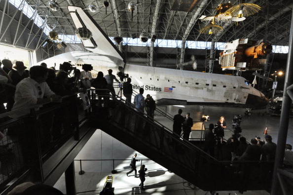 A former parking lot manager at the Smithsonian National Air and Space Museum annex in Chantilly has pleaded guilty to his involvement in a conspiracy to steal more than $1 million in visitors' parking fees, court records show. (Getty Images)