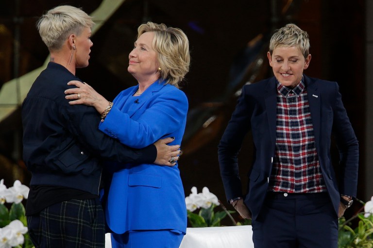 Democratic presidential candidate Hillary Rodham Clinton, center, greets Pink as Ellen DeGeneres watches during a taping of 