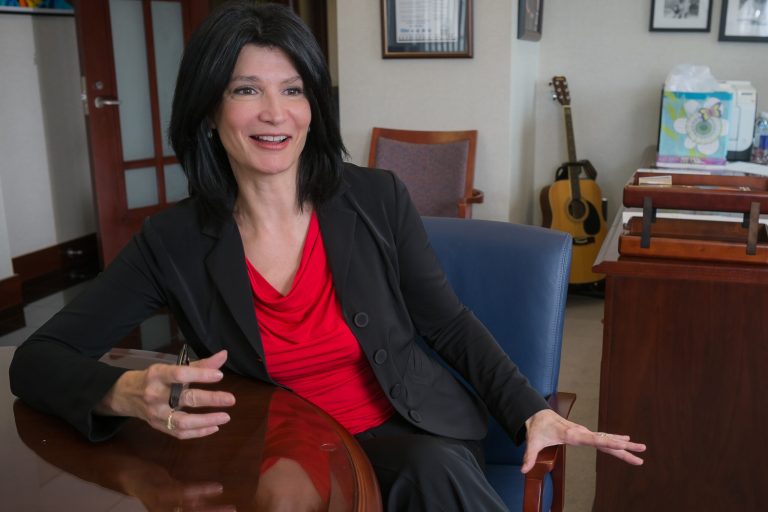 In this photo taken Sept. 19, 2014, National Education Association (NEA) President Lily Eskelsen Garcia answers questions during an interview with The Associated Press in her office at NEA headquarters in Washington. (AP Photo)Â 