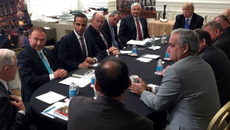George Papadopoulos, third from left, sits at a table with then-candidate Trump and others at what is labeled at a national security meeting. 