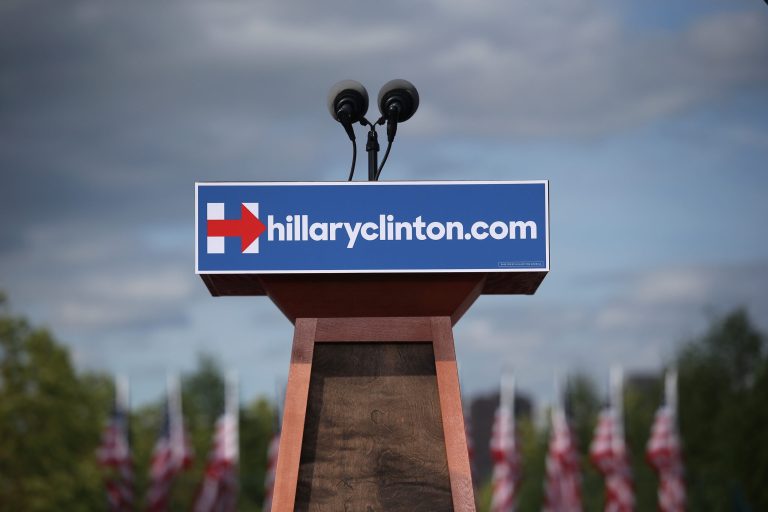 A podium awaits the arrival of former U.S. Secretary of State Hillary Clinton for her presidential campaign launch rally on June 13, 2015 in New York City. (Photo by John Moore/Getty Images)