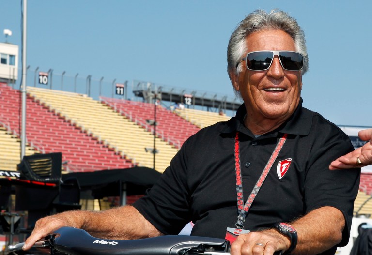 Racing legend Mario Andretti believes Donald Trump would win in an auto race against Hillary Clinton. (AP Photo/Mel Evans)