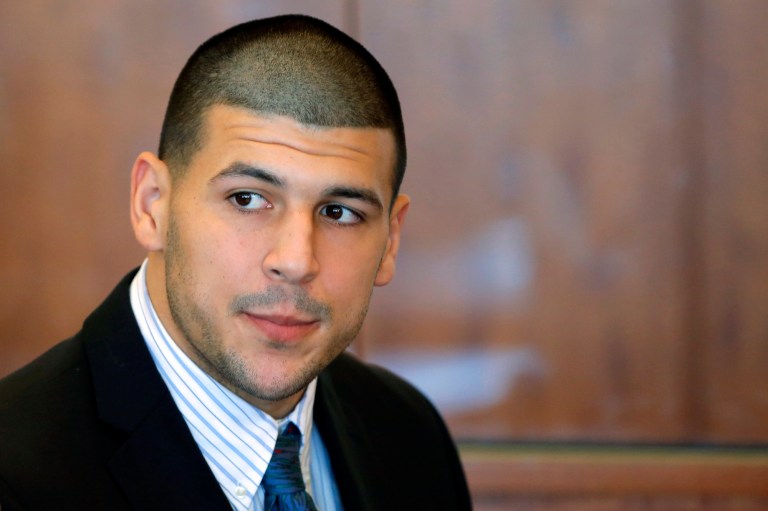 Former New England Patriots NFL football player Aaron Hernandez attends a pretrial court hearing in superior court in Fall River, Mass. Hernandez, who already faces a murder charge in a man's shooting death last year, was indicted Thursday, May 15, 2014, on new murder charges in an unrelated 2012 double slaying in Boston, police said. (AP Photo/Brian Snyder, Pool, File)