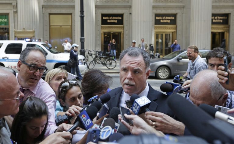 Chicago Police Superintendent Garry McCarthy speaks to the media outside a downtown high-rise office building following a shooting inside the building, Thursday, July 31, 2014, in Chicago. Police said a demoted worker shot and critically injured his company's CEO before fatally shooting himself. (AP Photo/M. Spencer Green)
