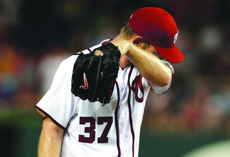 Alex Brandon/AP
Davey Johnson said all the shutdown talk had fatigued Stephen Strasburg mentally, resulting in the Nationals ending his season.