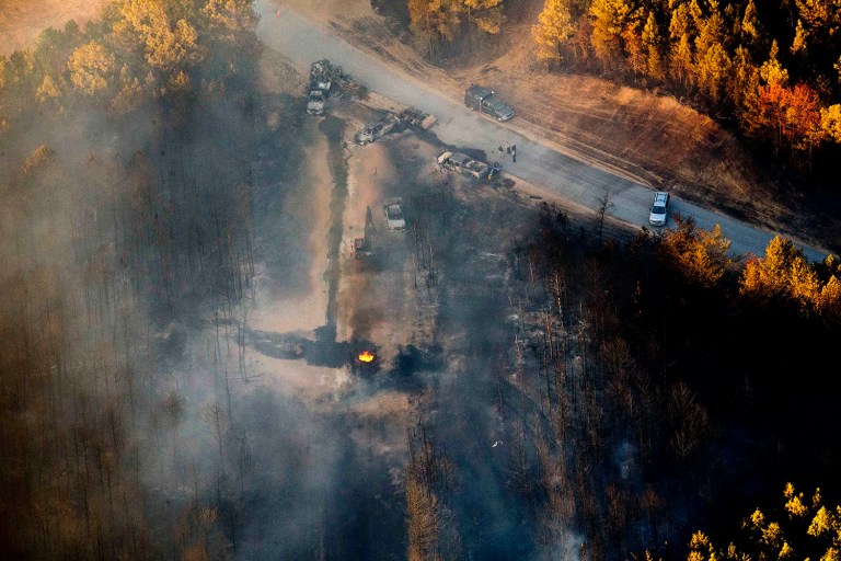 The Colonial Pipeline gasoline line will be shut down for at least a week after an explosion and fire Monday evening. (AP Photo/Brynn Anderson)