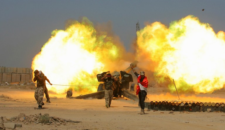 A federal appeals court has scheduled oral arguments for later this year on a soldier's lawsuit that claims the war against Islamic State is illegal. (AP Photo/Anmar Khalil, File)