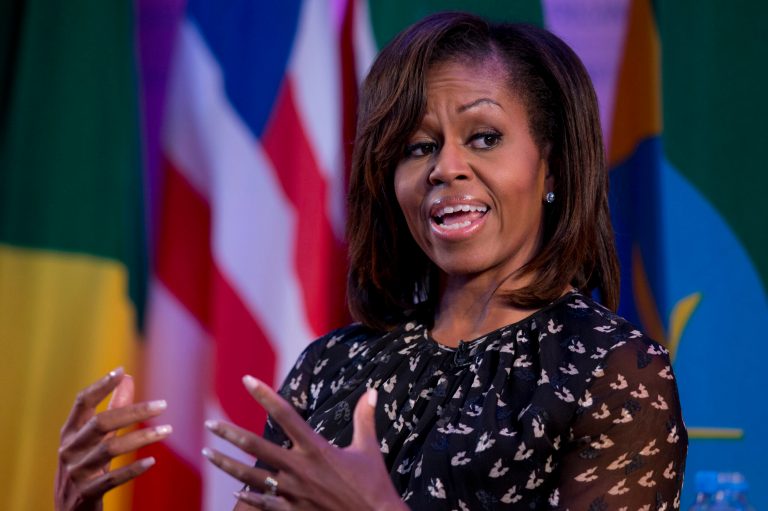 U.S. first lady Michelle Obama on Tuesday described living in the White House as like being in a âreally nice prison.â  (AP Photo/Carolyn Kaster)