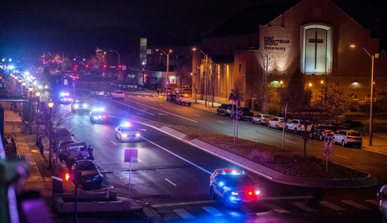 Public safety vehicles follow the hearse carrying the body of slain El Paso County Sheriff's Deputy Micah Flick, Monday, in Colorado Springs, Colo. Flick was shot and killed while he and other officers were investigating a stolen vehicle earlier Monday. (Christian Murdock/The Gazette via AP)