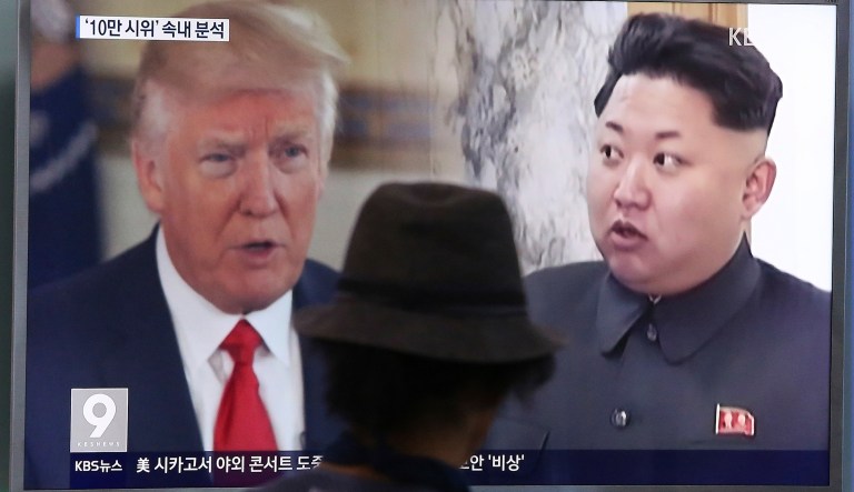 In this Aug. 10, 2017, file photo, a man watches a television screen showing President Trump and North Korean leader Kim Jong Un during a news program at a train station in Seoul, South Korea. Trump's recent trip to Asia and his designation of North Korea as a state sponsor of terrorism, unfortunately, reveal either an inability or disinclination to conduct foreign policy in this manner. (AP Photo/Ahn Young-joon, File)