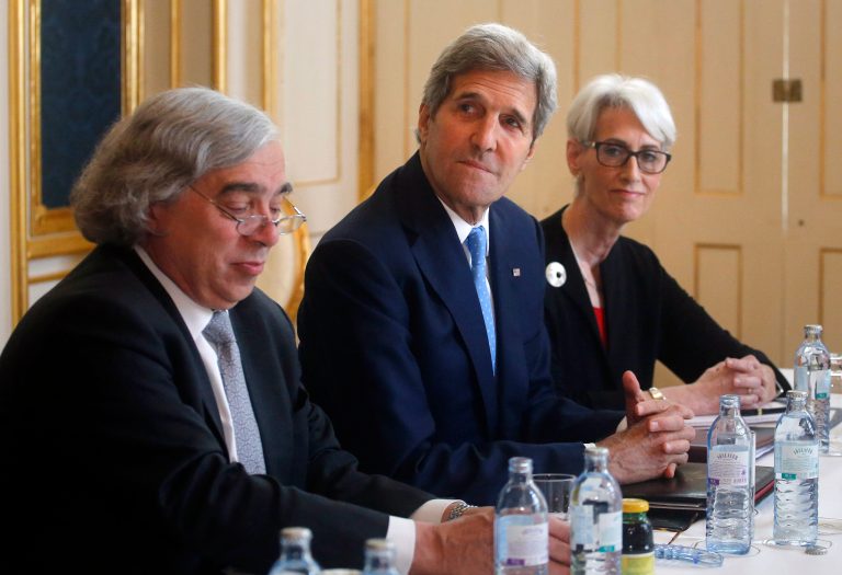U.S. Secretary of Energy Ernest Moniz, U.S. Secretary of State John Kerry, center, and U.S. Under Secretary for Political Affairs Wendy Sherman meet Iranian Foreign Minister Javad Zarif at a hotel in Vienna, Austria, Tuesday June 30, 2015. (Carlos Barria/Pool via AP)