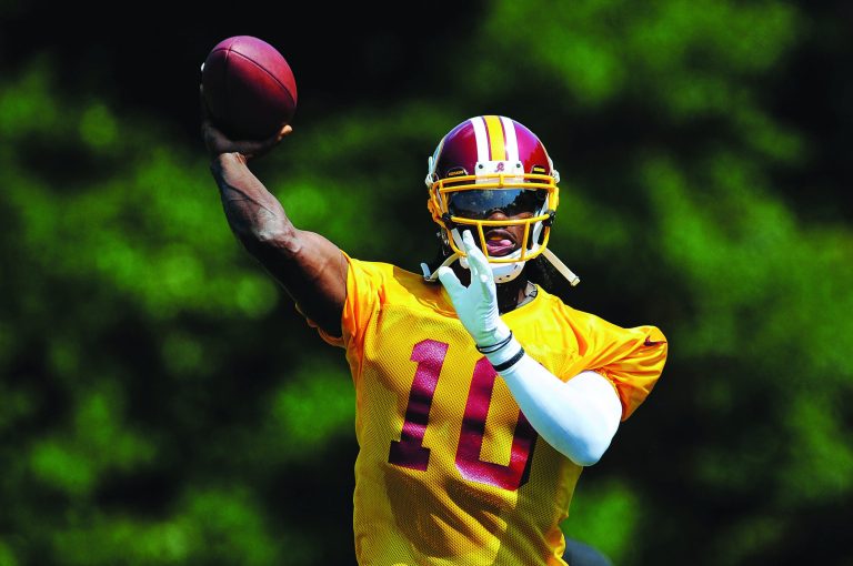 Patrick McDermott/Getty Images
Quarterback Robert Griffin III and the Redskins had their first day of training camp on Thursday in Ashburn.