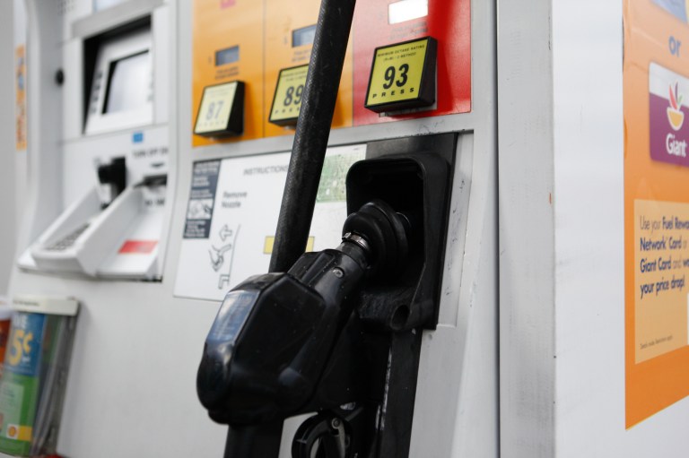 The D.C. Council gave initial approval to a change that would scrap the city's 23.5-cents-per-gallon tax on gasoline for an 8.3 percent tax on wholesale gas, following the lead of neighboring Maryland and Virginia.