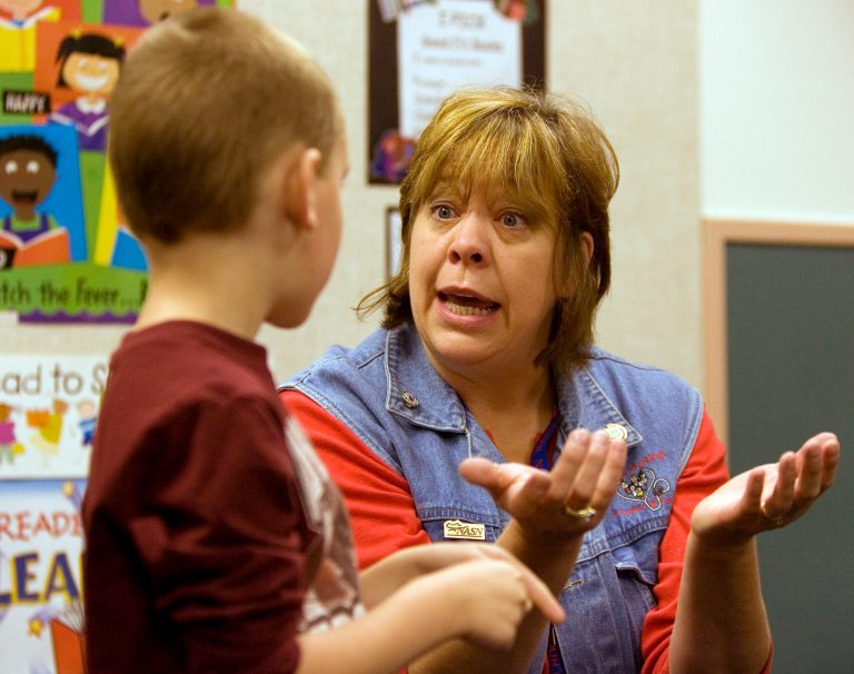 School nurse Nina Fekaris, right, shows first-grader Ian Bak how to wash his hands at Rock Creek elementary school in Beaverton, Ore., Thursday, Sept. 10, 2009. (AP Photo/Don Ryan)