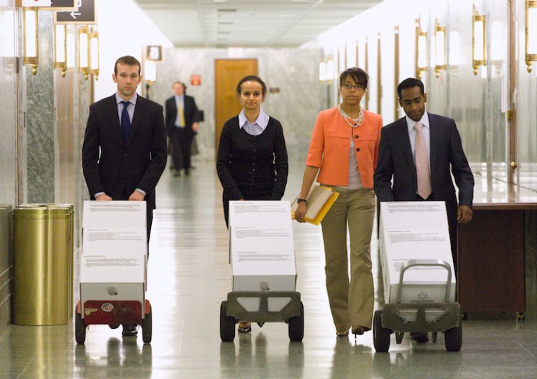 Obama's new regulation would force employers to "collect summary pay data by gender, race and ethnicity." (AP Photo/Harry Hamburg)