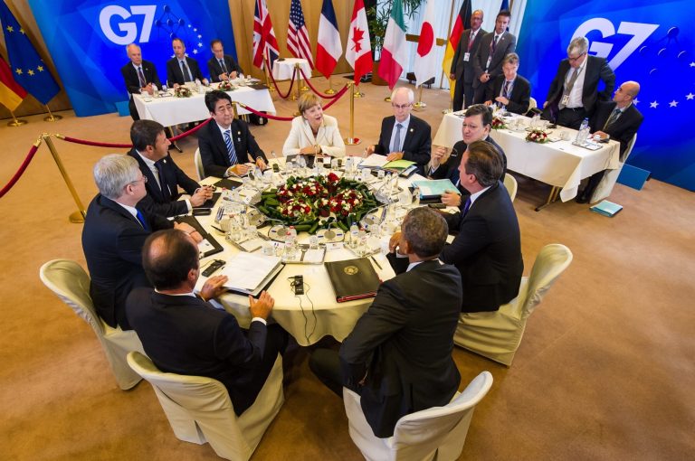 Group of 7 leaders from front center right clockwise, U.S. President Barack Obama, French President Francois Hollande, Canadian Prime Minister Stephen Harper, Italian Prime Minister Matteo Renzi, Japanese Prime Minister Shinzo Abe, German Chancellor Angela Merkel, European Council President Herman Van Rompuy, European Commission President Jose Manuel Barroso and British Prime Minister David Cameron  a G7 summit at the EU Council building in Brussels on Thursday, June 5, 2014. The leaders of the G-7 group of major economies center their effort during the concluding day of their summit on spurring growth and jobs in an attempt to reinforce a rebound from the global financial crisis. (AP Photo/Geert Vanden Wijngaert)