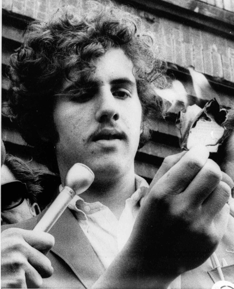 This is a June 20, 1969 photo of Ken Love burning what he claimed was a draft card and his Students for a Democratic Society card in Chicago. (AP Photo)