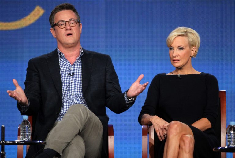 Host Joe Scarborough and co-host Mika Brzezinski speak onstage during the 'Morning Joe' panel during the NBCUniversal portion of the 2012 Winter TCA Tour at The Langham Huntington Hotel and Spa on January 7, 2012 in Pasadena, California. (Photo by Frederick M. Brown/Getty Images