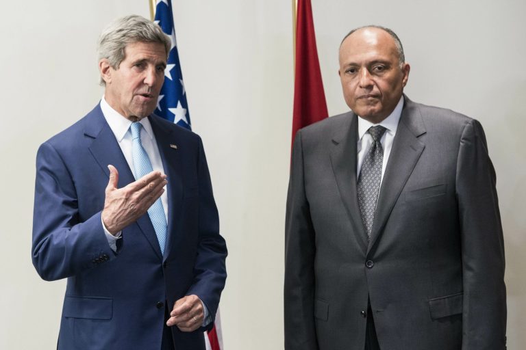 U.S. Secretary of State John Kerry, left, and Egyptian Foreign Minister Sameh Hassan Shoukry speak to journalists before a meeting at a hotel in Cairo, Egypt Sunday, June 22, 2014. Kerry arrived Sunday in the Egyptian capital to meet with Egyptian officials including President Abdel-Fattah el-Sissi in the highest-level American outreach since he took office. The United States is moving forward with attempts to thaw relations with Egypt that have cooled over concerns that the government in Cairo has conducted sham trials, imprisoned journalists and issued a violent crackdown on its political enemies. (AP Photo/Brendan Smalowski, Pool)