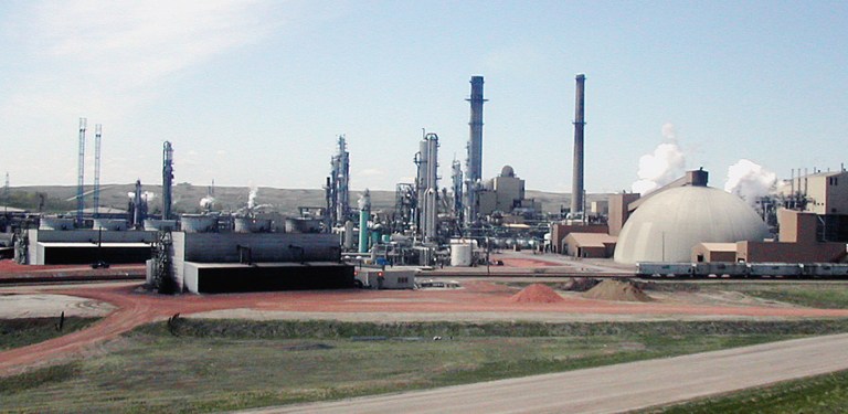 FILE - This May 21, 2004 file photo shows the Great Plains Synfuels Plant near Beulah, N.D. Bismarck-based Dakota Gasification Co. approved plans to add a urea fertilizer production facility at the plant. Urea will be the 10th co-product produced at the plant, which also makes two other fertilizers _ ammonia and ammonium sulfate. It is scheduled to be finished in early 2017 and will produce 1,100 tons of urea daily. (AP Photo/Bismarck Tribune, Lauren Donovan, File)