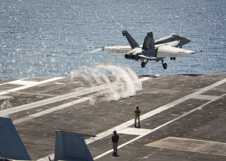 The U.S. Navy determined that the most recent encounter was safe, although encounters from February were described as unsafe after Russian aircraft did not have radio transponders turned on. An F/A-18E Super Hornet launches from the aircraft carrier USS Carl Vinson as they transit the western Pacific Ocean. (Spc. 3rd Class Matthew Granito/U.S. Navy via AP)