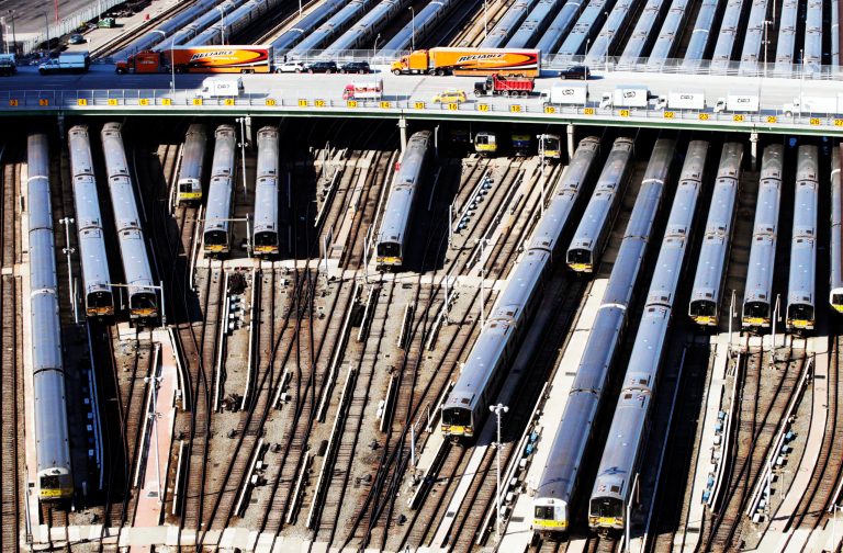 Trains are parked in a rail yard on New York's west side used by Amtrak, New Jersey Transit, and the Long Island Railroad. The rail yard is now covered by the Hudson Yards development. A proposed commuter rail tunnel between New York and New Jersey would connect with this rail yard. A prominent New York City developer who has advised the Trump administration on infrastructure refuted reports he was cheering on the president's decision not to pay for half of the estimated $13 billion price tag for the project. (AP Photo/Mark Lennihan, File)