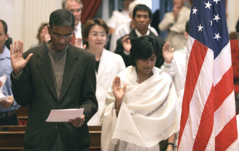 Applicants take the oath during a naturalization ceremony in Montpelier, Vt. (AP File)