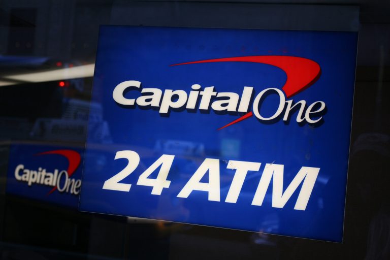 FILE - This Jan. 25, 2009 file photo shows a Capital One ATM, in New York. Capital One Financial Corp., reports quarterly earnings Thursday, Oct. 16, 2014, after the market close. (AP Photo/Mark Lennihan, File)