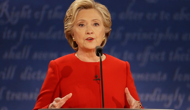 When Trump attacked free trade in tonight's debate, Clinton responded by running away from the trade issue. (AP Photo/Julio Cortez)