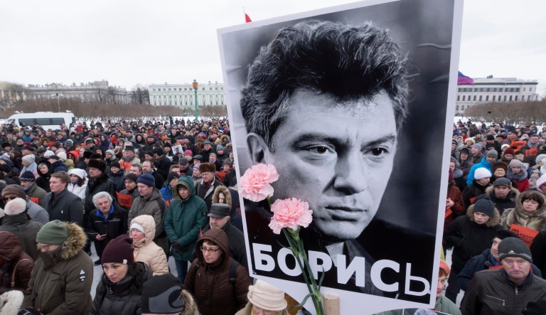 The United States called on Russia to fully investigate the death of opposition leader Boris Nemtsov, following the conviction of five men. Nemtsov, a former deputy prime minister, was gunned down just outside the Kremlin wall. (AP Photo/Dmitri Lovetsky, file)