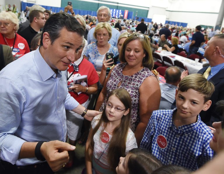 Republican presidential candidate Sen. Ted Cruz, R-Texas, left, greets supporters during the Faith & Freedom BBQ, Monday, Aug. 24, 2015, in Anderson, S.C. (AP Photo/Rainier Ehrhardt)