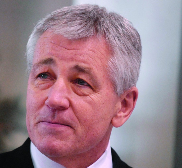 FILE - This Dec, 18, 2008 file photo shows then-Nebraska Sen. Chuck Hagel in Omaha, Neb. President Barack Obama will nominate Hagel as his next defense secretary, a senior administration official said Sunday, Jan. 6, 2013. The selection of the decorated Vietnam combat veteran sets up a potentially contentious confirmation hearing because Hagel has come under scrutiny from his former colleagues over his positions on Israel and Iran. Some Republicans already have declared their public opposition to Hagel replacing Pentagon chief Leon Panetta in Obama's second-term Cabinet. (AP Photo/Dave Weaver, File)