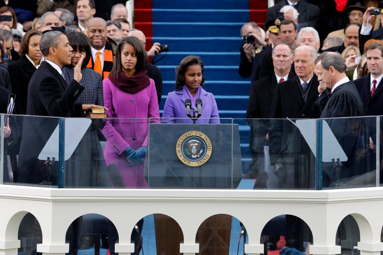 President Obama takes the oath of office from Chief Justice John Roberts at the ceremonial swearing-in on the West Front of the U.S. Capitol during the 57th Presidential Inauguration in Washington, Monday, Jan. 21, 2013. (AP Photo/Scott Andrews, Pool)