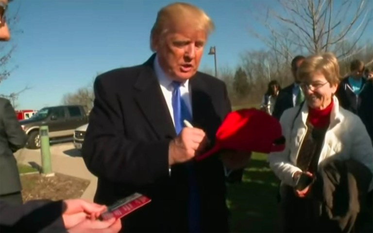 According to a report, the Republican presidential front-runner greeted voters outside a fire station in Waukesha, Wis. on Tuesday afternoon that had been set up as a polling station for the Wisconsin primary. (Screen shot courtesy of AP YouTube video)