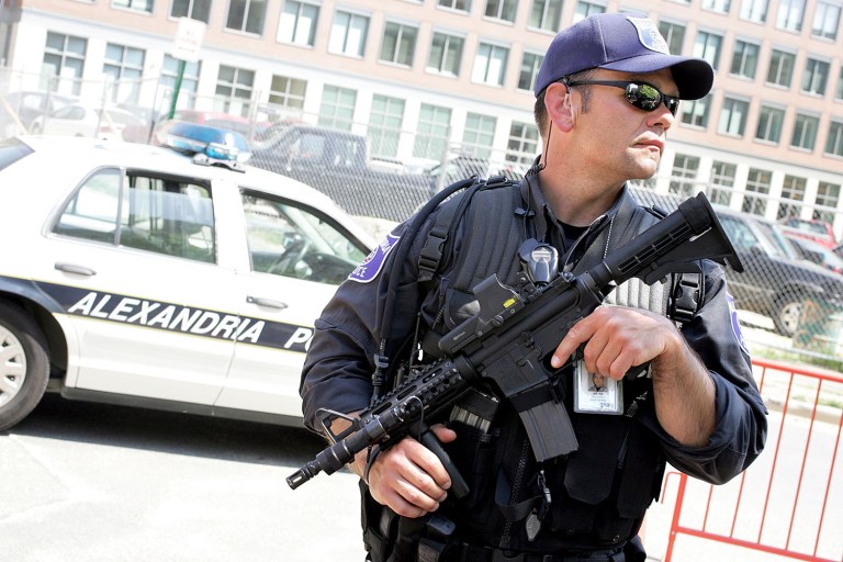 An police officer patrols outside the U.S. Federal Courthouse in Alexandria, Va. Mohamad Jamal Khweis is scheduled to appear at the courthouse Thursday afternoon. (Examiner File)