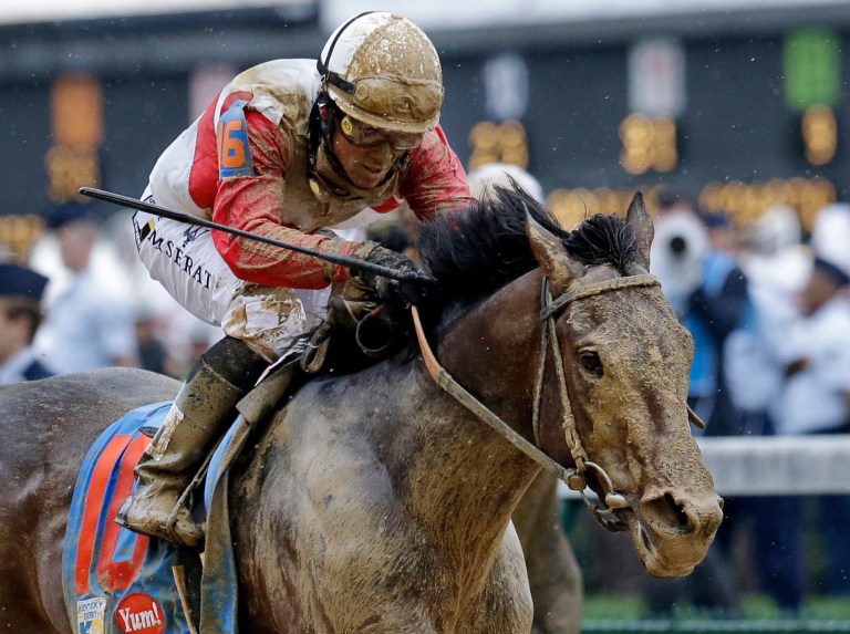 J. David Ake/AP
Orb, ridden by jockey Joel Rosario, will try to be the first horse since Affirmed in 1978 to win the Triple Crown.