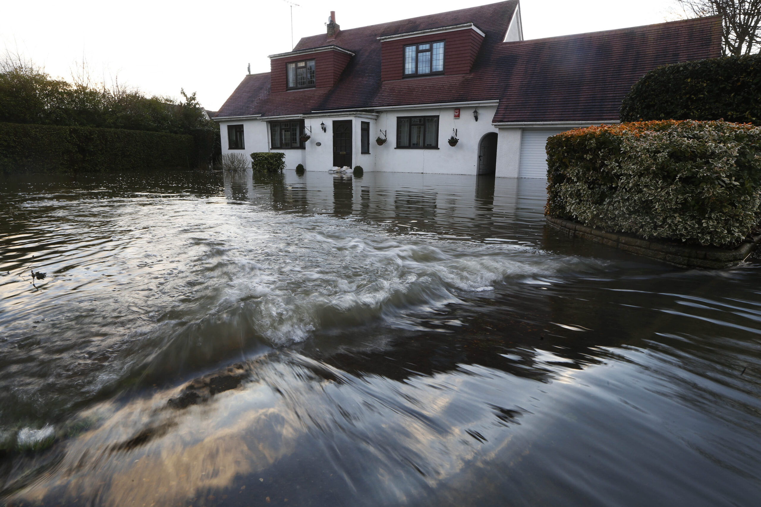 River Thames breaches its banks near London