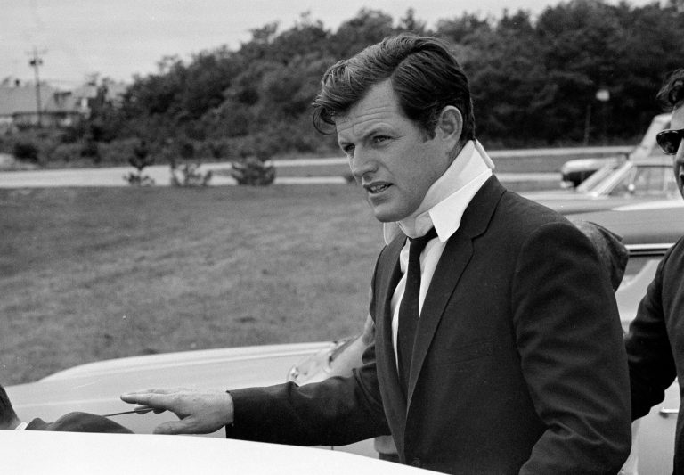 This July 22, 1969 file photograph shows U.S. Sen Edward Kennedy, D-Mass., arriving back at his home in Hyannisport, Mass., after attending the funeral of Mary Jo Kopechne in Pennsylvania. A new feature film is in the works about the tragedy on the small Massachusetts island nearly a half century ago that rocked the Kennedy political dynasty. Kopechne drowned when a car driven by Kennedy went off a bridge on Chappaquiddick, a small island in Edgartown, Mass., on the eastern end of Martha's Vineyard on July 18, 1969. (AP Photo/Frank C. Curtin)