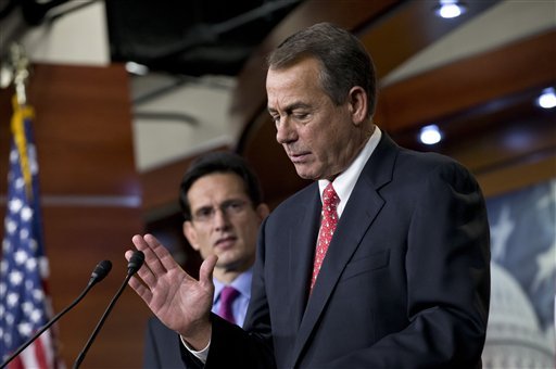 Speaker of the House John Boehner, R-Ohio, joined by House Majority Leader Eric Cantor, R-Va., left, speaks to reporters about the fiscal cliff negotiations at the Capitol in Washington, Friday, Dec. 21, 2012. Hopes for avoiding the 